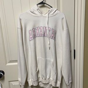 Cream with pink writing